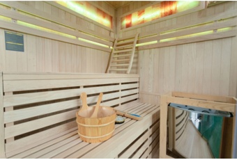 Sauna fińska narożna Nordum Solea 3-osobowa brązowa - drewniana - z panelami solnymi Sauna fińska narożna Nordum Solea 3-osobowa brązowa